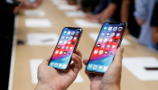 A demonstration of the newly released Apple products is seen following the product launch event in Cupertino