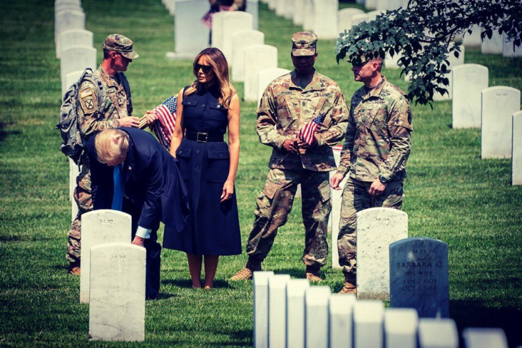 Melania And Donald Trump Pay Early Respects At Arlington National Cemetery