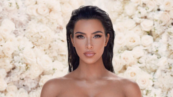 Kim Kardashian And Kanye West ‘Bursting With Happiness,’ Reveal First Photo Of Baby No. 4