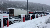 Electric cars are seen at Tesla charging station