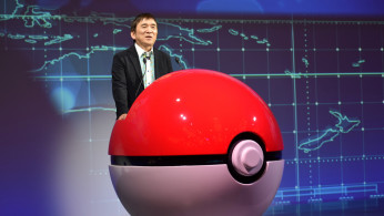 Tsunekazu Ishihara, chief executive of the Pokemon Company, speaks at a news conference in Tokyo