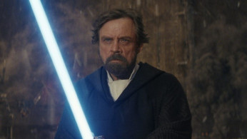 Luke Skywalker (Mark Hamill) with his lightsaber in 'Star Wars: The Last Jedi'