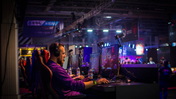 Man playing an online game on his personal computer