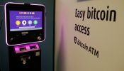 The exchange rates of Bitcoin, Ether, Litecoin and Bitcoin Cash are seen on the display of a cryptocurrency ATM