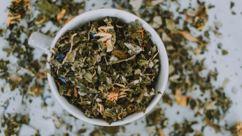 different herbs in a bowl