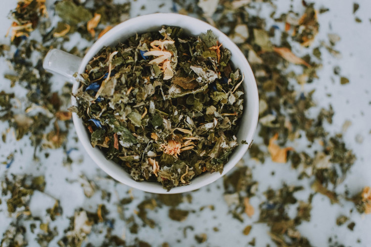different herbs in a bowl
