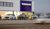 A long exposure picture shows cars of Swedish automobile manufacturer Volvo displayed in front of a showroom of Stierli Automobile AG company in St. Erhard