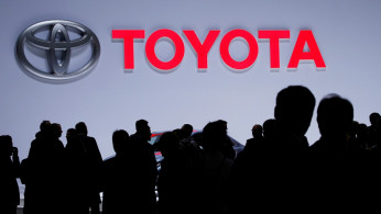 A Toyota logo is displayed at the 89th Geneva International Motor Show in Geneva