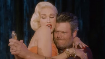 Gwen Stefani and Blake Shelton in the 'You Make Me Feel Like Christmas' music video