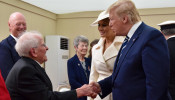 Melania and Donald Trump meet veteran Thomas Cuthbert