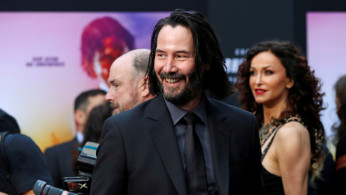 Cast member Keanu Reeves arrives for a screening of the movie 
