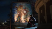 Peter Parker with an Iron Man mural in 'Spider-Man: Far From Home'