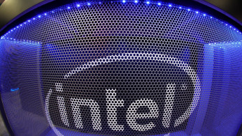 Computer chip maker Intel's logo is shown on a gaming computer display during the opening day of E3, the annual video games expo revealing the latest in gaming software and hardware in Los Angeles