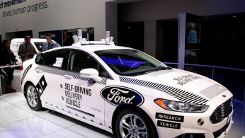 A Ford Fusion hybrid, Level 4 autonomous vehicle is displayed at the North American International Auto Show at Cobo Center in Detroit, United States