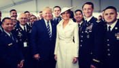 First Lady Melania Trump and President Donald Trump at the D Day Memorial in Normandy France, pictured with some veterans and ladies and gentlemen of the U.S. Army