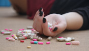 Person Holding Medical Pills