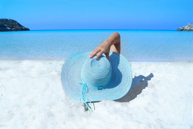 Blue hat in a sunny beautiful summer