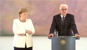 Angela Merkel shakes again