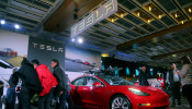 A Tesla Model 3 car is displayed at the Canadian International AutoShow in Toronto