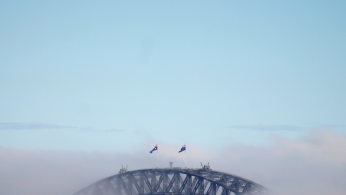 The Sydney Harbour Bridge is shrouded by fog in Australia