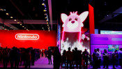 Attendees line-up at the Nintendo booth at E3, the annual video games expo experience the latest in gaming software and hardware in Los Angeles