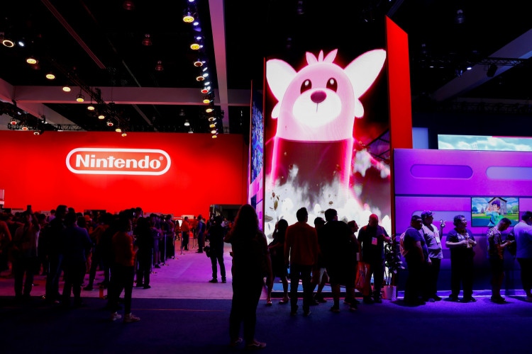 Attendees line-up at the Nintendo booth at E3, the annual video games expo experience the latest in gaming software and hardware in Los Angeles