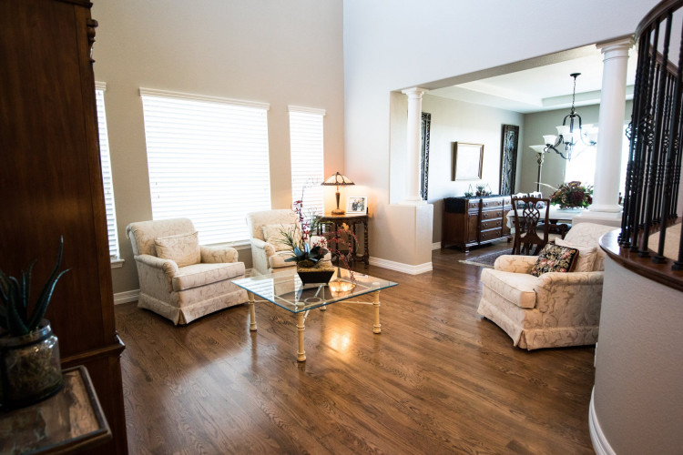 A cozy room featuring beautiful sofa chairs.