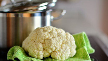Cauliflower on green textile.