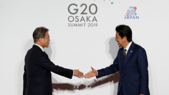 Moon Jae-in and Shinzo Abe