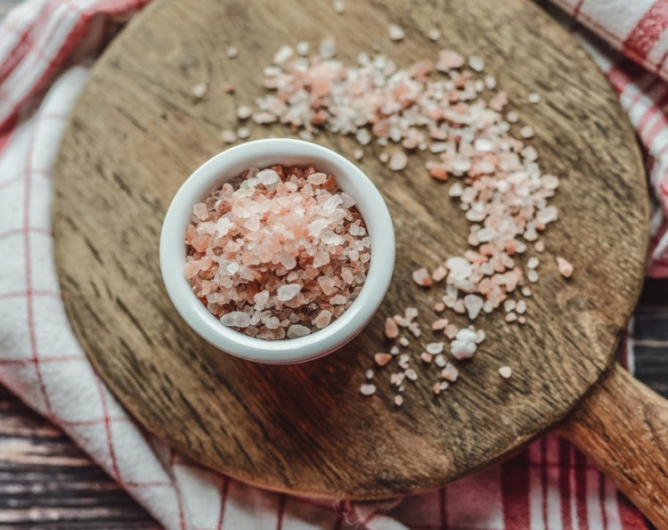 Pink Himalayan salt in a ceramic bowl.