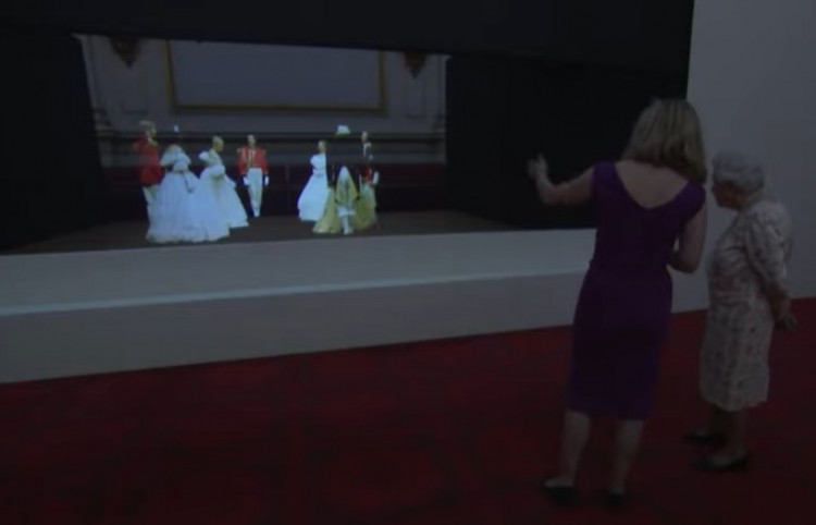Queen Elizabeth II Watches In Awe Over A 3D Illusion Of A Victorian Ball