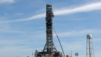 NASA's Space Launch System mobile launcher stands atop Launch Pad 39B at the Kennedy Space Center in Cape Canaveral