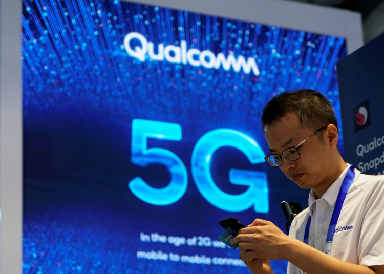 Signs of Qualcomm and 5G are pictured at Mobile World Congress (MWC) in Shanghai