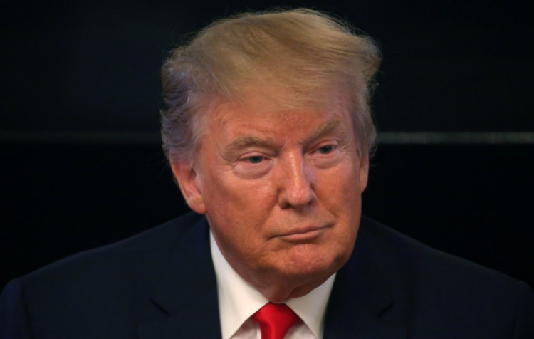 U.S. President Donald Trump participates in the "Pledge to America's Workers - One year Celebration" event in the State Dining Room of the White House in Washington, U.S., July 25, 2019.