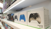 Xbox gaming controllers sit on a display shelf at Microsoft's new Oxford Circus store ahead of its opening in London