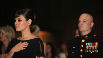 Actress Mila Kunis attending the 236th Marine Corps birthday ball for 3rd Battalion, 2nd Marine Regiment, 2nd Marine Division in Greenville, N.C., Nov. 19, 2011, as the guest of Sgt. Scott Moore.