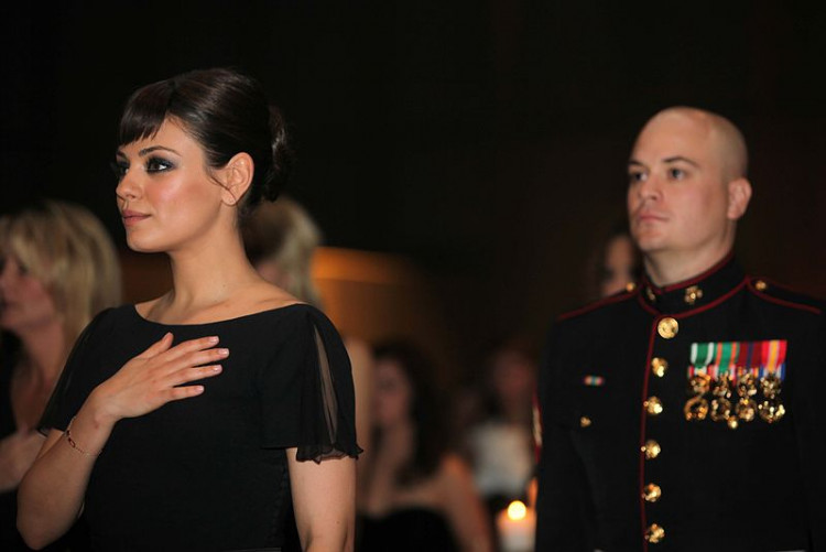 Actress Mila Kunis attending the 236th Marine Corps birthday ball for 3rd Battalion, 2nd Marine Regiment, 2nd Marine Division in Greenville, N.C., Nov. 19, 2011, as the guest of Sgt. Scott Moore.
