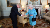 Boris Johnson arrives at Buckingham Palace in London for an audience with Queen Elizabeth II, in London