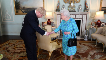 Boris Johnson arrives at Buckingham Palace in London for an audience with Queen Elizabeth II, in London
