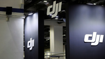 DJI signages are pictured at their booth at Interpol World in Singapore July 2, 2019