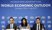 Gita Gopinath, Economic Counsellor and Director of the Research Department at the International Monetary Fund (IMF), next to Gian Maria Milesi-Ferretti, Deputy Director of Research Department of the IMF, speaks during a news conference in Santiago