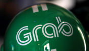 A Grab motorbike helmet is displayed during Grab's fifth anniversary news conference in Singapore