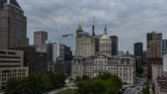 City Hall and the downtown neighborhood is seen in Baltimore, Maryland