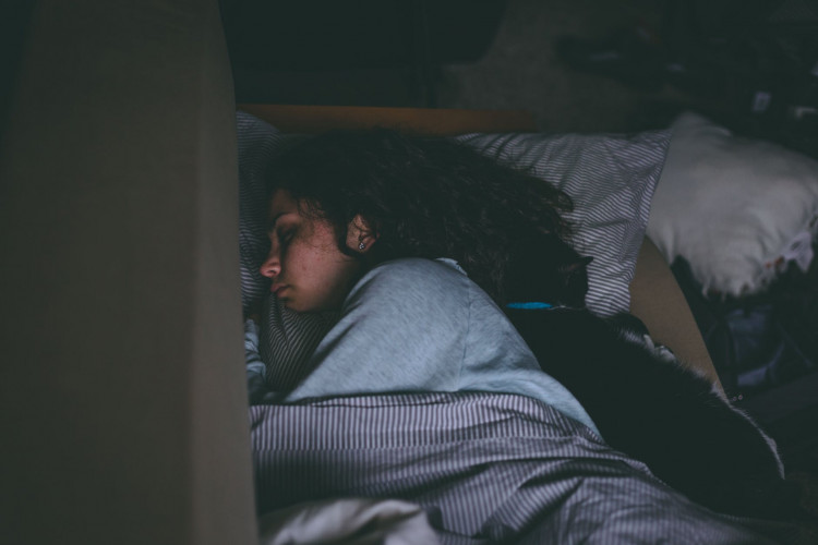Tired woman sleeping.