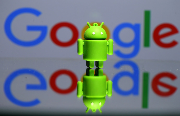 A 3D printed Android mascot in front of a Google logo in this illustration