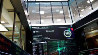 A trading screen is seen following the opening of the markets by British Chancellor of the Exchequer Philip Hammond and Chinese Vice-Premier Hu Chunhua at the London Stock Exchange in London