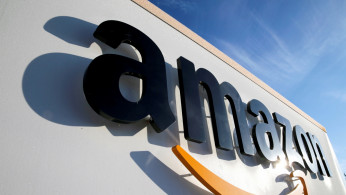 The logo of Amazon is seen at the company logistics centre in Boves