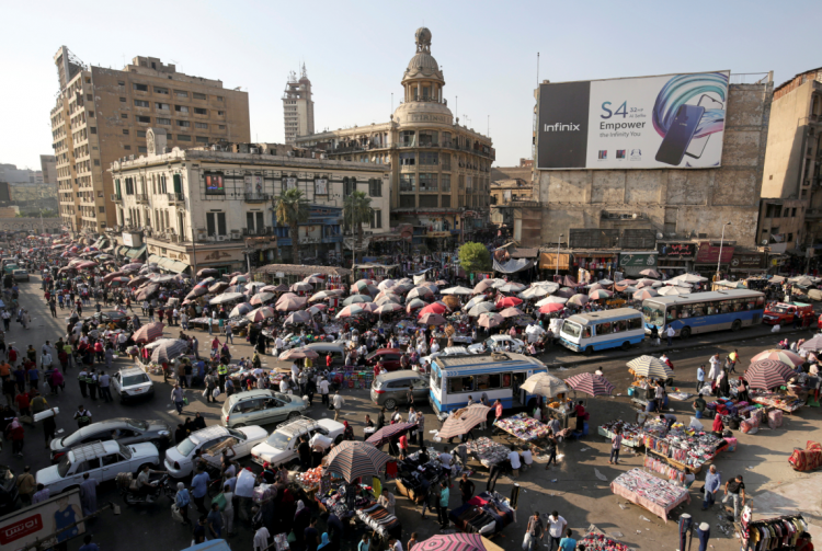 People shop at Al Ataba, a popular market in central Cairo