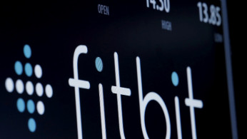 The ticker symbol for Fitbit is displayed at the post where it is traded on the floor of the New York Stock Exchange (NYSE) February 23, 2016. 