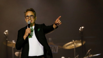 Robert Downey Jr. speaks on stage before The Rolling Stones' No Filter U.S. Tour at Rose Bowl Stadium in Pasadena